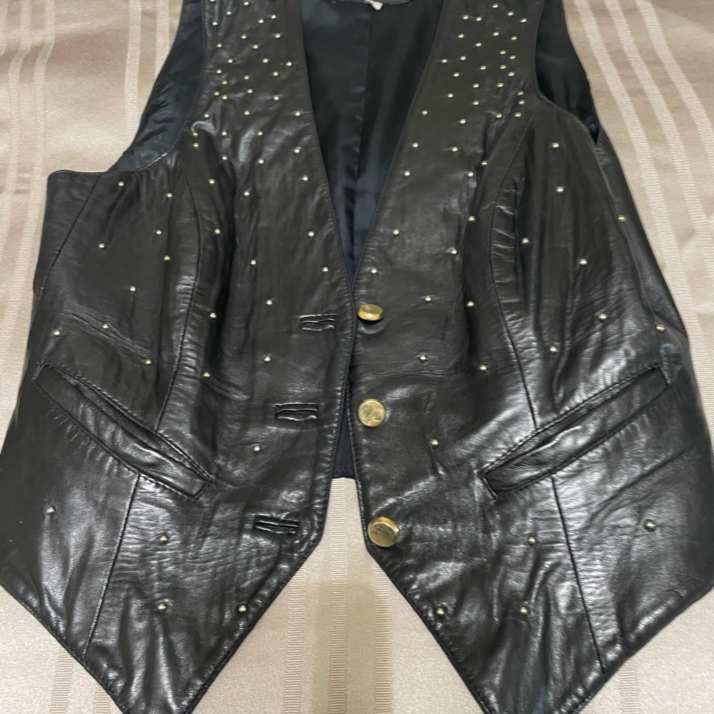 Black leather studded vest